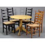 A maple-finish circular drop-leaf pedestal kitchen table on turned centre column & four cabriole