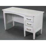 A white painted mahogany typist’s desk, fitted with a brushing slide above three long drawers to the