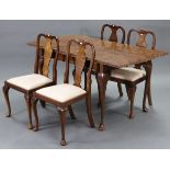 A set of four Queen Anne-style burr-walnut splat-back dining chairs with padded drop-in-seats, &