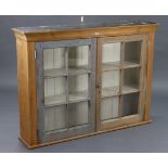 A pine dresser top with moulded cornice & fitted two shelves enclosed by pair of glazed doors,