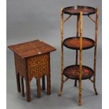 A Chinese-style cane & lacquered jardinière stand of three circular tiers, 12¼” diameter x 36½”