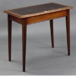 An Edwardian mahogany writing table inset tooled black leather to the rectangular top, & on square