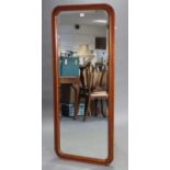 A large mahogany frame wall mirror with moulded edge & inset bevelled plate, 60¾” x 25”.