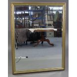 A large gilt frame rectangular wall mirror inset bevelled plate, 50” x 39”.