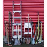 A Beldray aluminium three-way ladder; together with various garden tools.