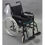 An Invacare “Ben NG” fold-away wheelchair.