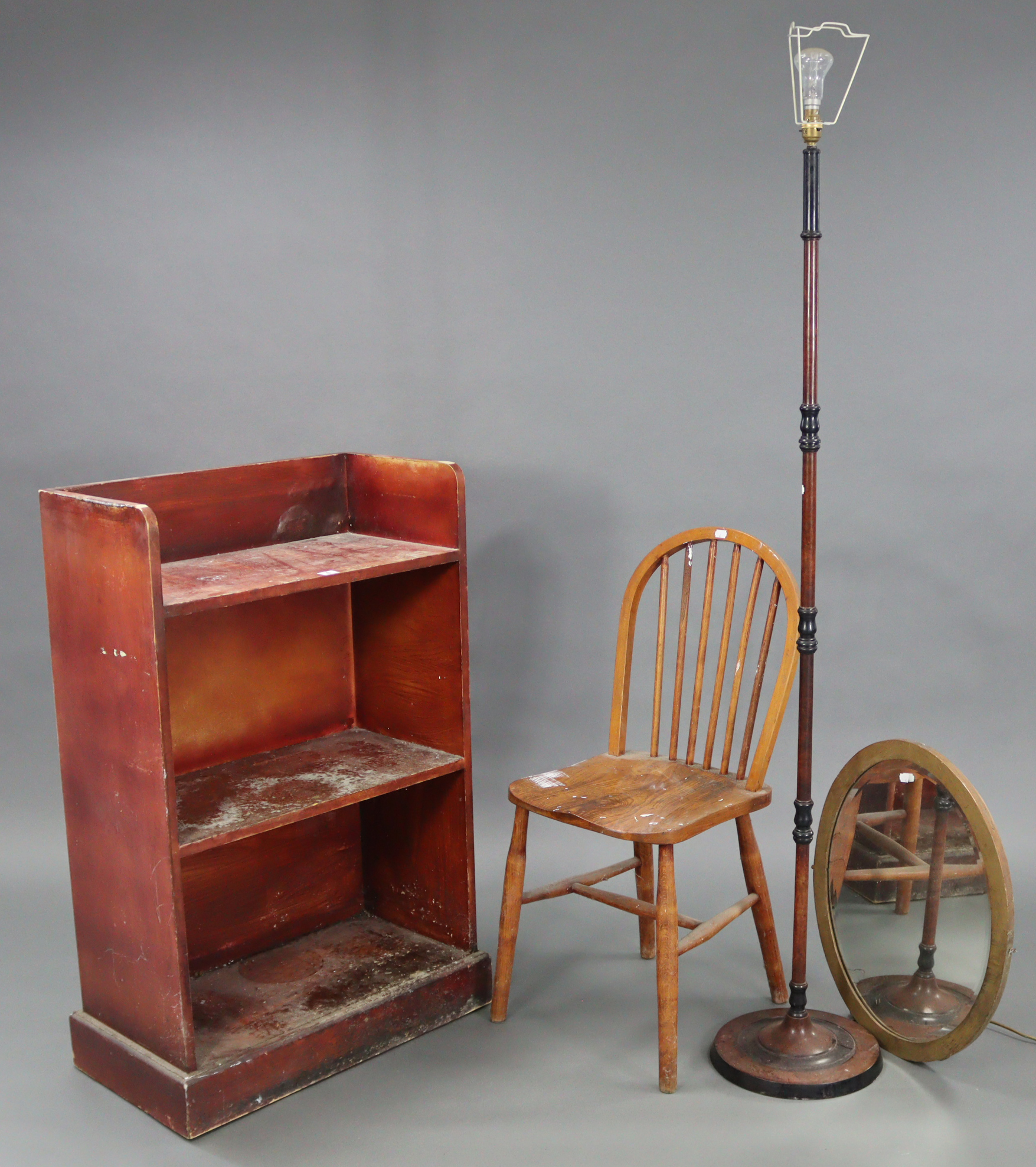 A pine tray-top three-tier standing open bookcase on plinth base, 25¼” wide x 39¾” high x 12½” deep;