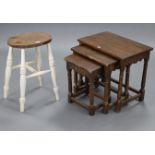 A natural & white painted elm kitchen stool with oval hard seat, & on turned legs with spindle