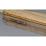 A Leonard & Mills “The H. L. Leonard Rod” three-piece 9’ split-cane fly fishing rod with spare end-