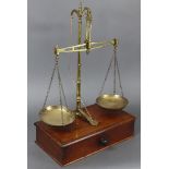 A late 19th/early 20th century large brass beam scale to weigh 15oz by W & T Avery of Birmingham,