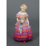 A Royal Doulton potted by Doulton figure “The Little Bridesmaid” (HN1433).