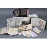 A large collection of World stamps in various albums, on leaves, & loose.