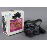 A Minolta “Dynax 500si Super” camera, with 55mm zoom lens, boxed.