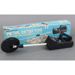 A Micronta metal detector, boxed.