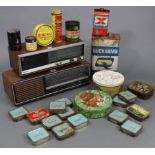 A Grundig radio receiver (model RF420); a Philips radio receiver; & various advertising tins.