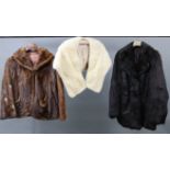 A white mink silk-lined ladies fur stole; a brown mink silk-lined ladies’ fur jacket; & a black