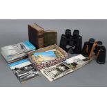 Two pairs of binoculars; together with various loose postcards, family photographs, etc.