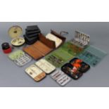 A large collection of fishing flies contained in a leather wallet & various tins; also hand-lines,