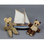 A painted wooden pond yacht “EF431” with sails, 15” high; & two teddy bears.