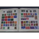 A Strand album & contents of GB & foreign stamps.
