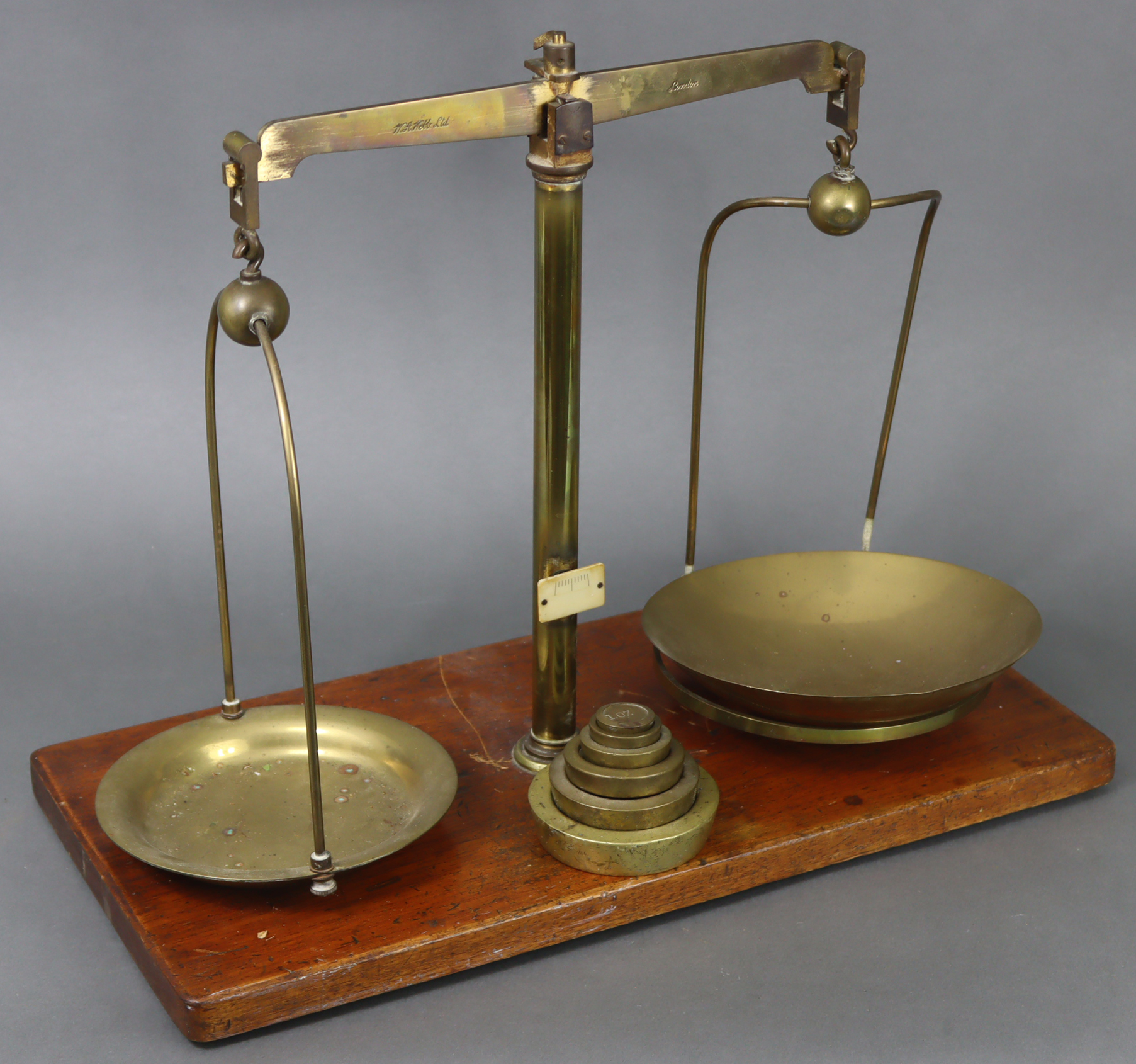 A late 19th/early 20th century large brass beam scale by W.A. Webb Ltd. of London mounted on