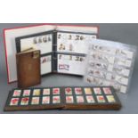 An album of mixed cigarette cards by W. D. & H. O. Wills, Premier Tobacco, Gallaher, etc.; various