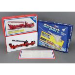 A Corgi scale model of an “American Lafrance Aerial Ladder Truck”; & a Corgi “Airport” box set, both