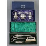 An Edwardian silver & stainless steel four-piece manicure set, Birmingham 1905; & a modern silver