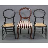 A Victorian carved beech balloon-back occasional chair with padded seat, & on slender cabriole legs;