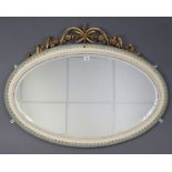 A ditto oval wall mirror with ribbon-bow surmount, & inset bevelled plate, 28¾” x 36½”.