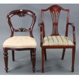 A Victorian-style balloon-back dining chair with padded seat, & on turned & fluted tapering