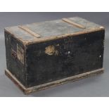 A black painted deal storage trunk with hinged lift-lid, & with wrought-iron side handles, 32¼” wide