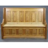 A white painted & natural pine pew with panelled back & hard seat, 59½” wide x 40” high x 21¾”