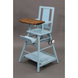 A mid-20th century pale blue painted wooden baby’s high/low chair.