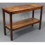 An oak rectangular two-tier side table on four square chamfered legs, 45” wide x 31” high x 16½”