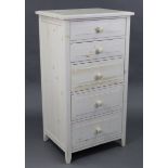 A white painted pine upright chest fitted five long graduated drawers with turned knob handles, 25¼”