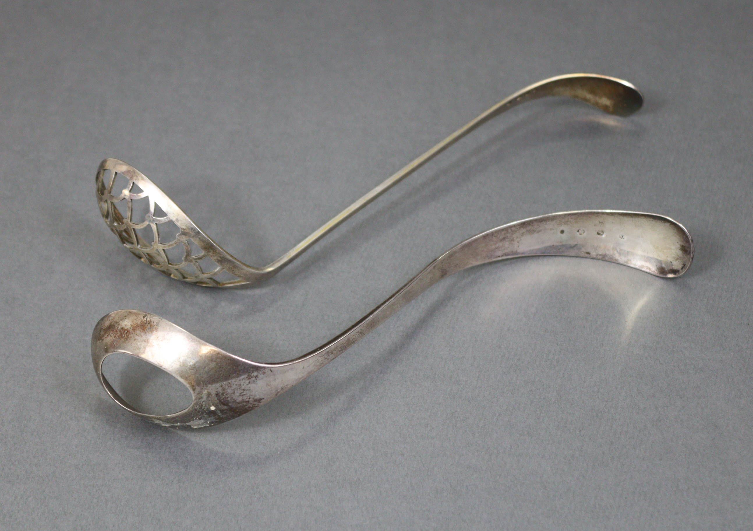 A Dutch silver .934 standard egg ladle with beaded edge to the long curved handle, 1889; & a similar - Image 2 of 4