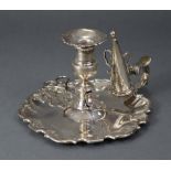 A George III silver large chamber candlestick, the short baluster column with removable drip-pan, on