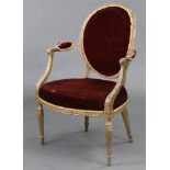 A late 18th century carved giltwood frame armchair, the oval padded back, wide seat, & open arms