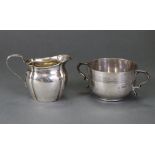 An Edwardian silver two-handled bowl with reeded band, London 1904 by Josiah Williams, 4 oz. ; & a