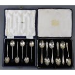 A set of six silver coffee spoons with oval petrae to the terminals, Birmingham 1924; & a set of six