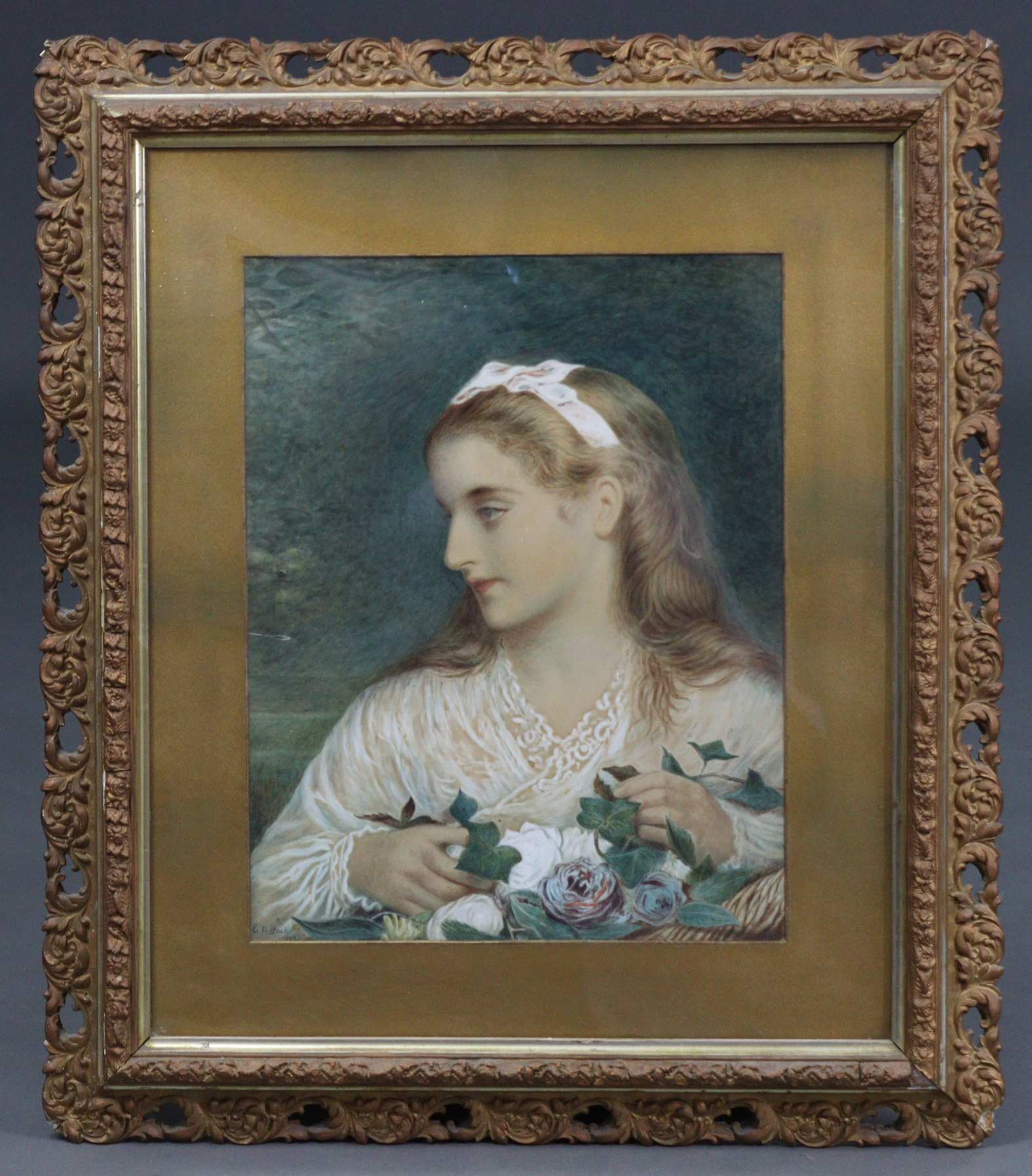 E.A. BUCK (19th century). A head-&-shoulders portrait of a young lady with bouquet of flowers.