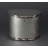 A 19th century Dutch silver (.833 standard) plain oval straight-sided tea caddy with slightly