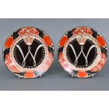 A pair of Dutch pottery plates commemorating the inauguration of Queen Welhelmina in 1898,
