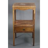 A George III mahogany two-tier washstand with moulded edge to the rectangular top above a shaped
