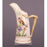 A Royal Worcester tusk jug of blush ivory ground with painted decoration of a bird amongst