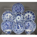 A group of seven various Chinese blue & white porcelain saucer dishes, including a pair decorated