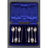 A set of six silver Albany pattern teaspoons & matching sugar tongs, Sheffield 1910-11, in fitted