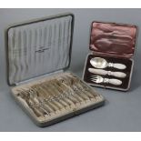 A set of six Georg Jensen “Cactus” design silver knives & forks, London import marks for 1937, in