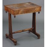 An early Victorian mahogany rectangular occasional table, on plain tapered supports with turned